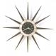Snider black Spanish-style starburst wall clock (electric, early 1960s)