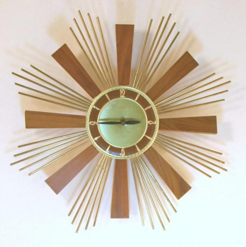Snider starburst wall clock with brass-plated metal rods and 8 wood rays (early/mid 1960s, electric)