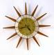 Snider starburst wall clock with 12 short walnut cones, brass dial (late 1960s, electric)