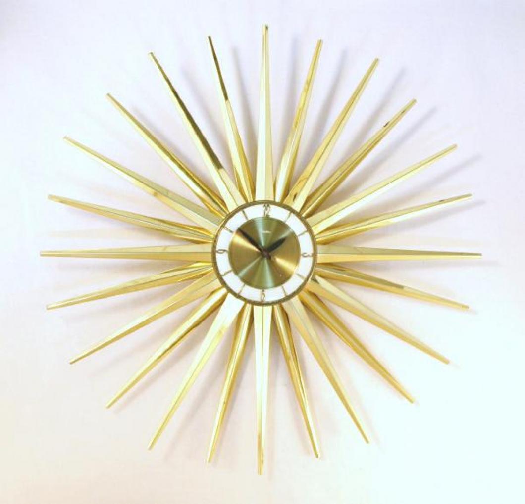 Snider large starburst wall clock with 24 brass-plated sheet metal rays (early/mid 1960s, electric)