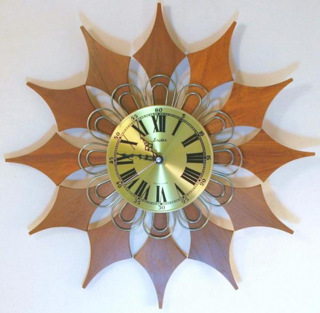 Snider starburst wall clock with brass dial, brass-plated metal rod loops and wood rays (late 1960s / early 1970s, battery movement)