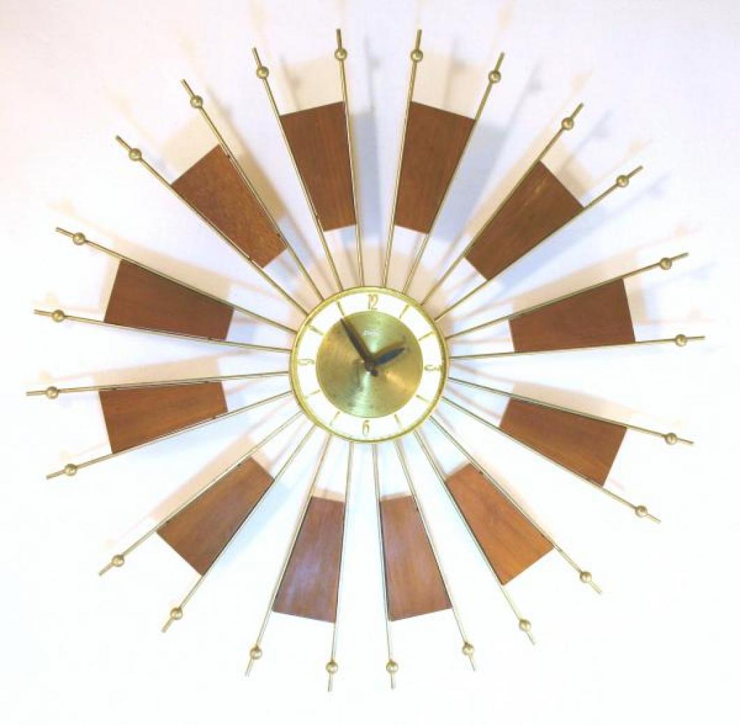 Snider starburst "windmill" wall clock with wood panels held by brass-plated metal rods (1960s, electric)