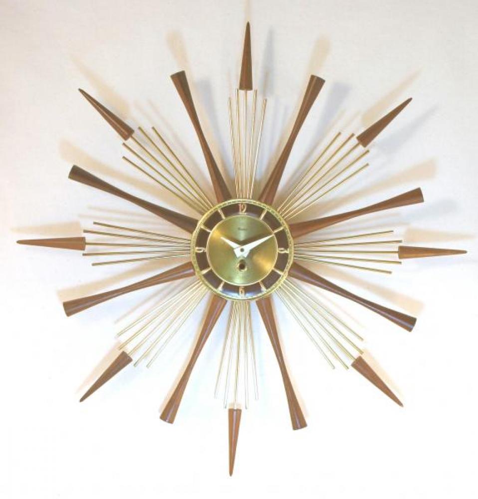 Snider starburst clock with brass plated rods, brass dial, walnut cones and cylindrical rays (1960s, original 8-day windup movement)