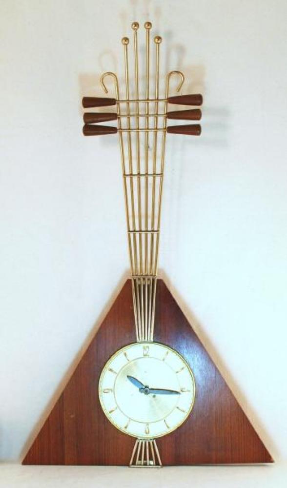 Snider "balalaika" shaped wall clock (early/mid 1960s, electric, teak/walnut wood)