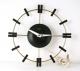 Snider black version wall clock (mid/late 1950s, electric, script name Snider on dial)