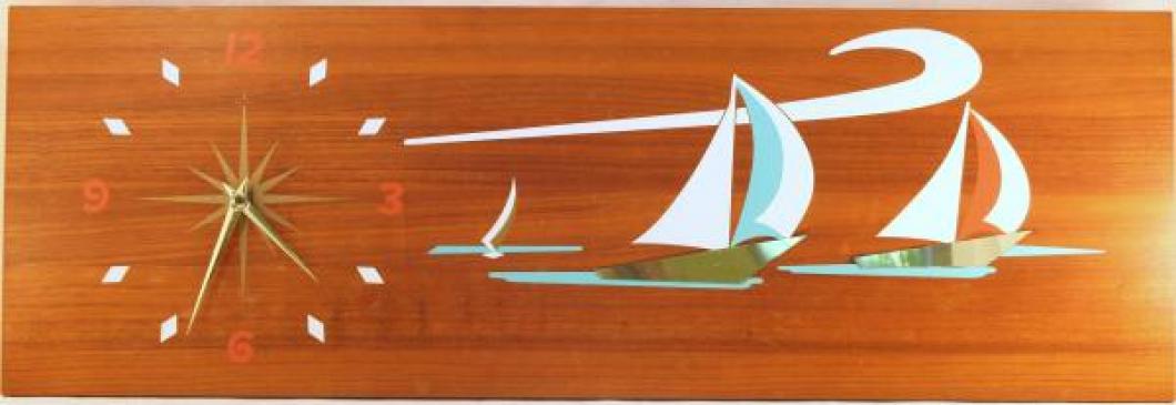 Snider SOUTH WINDS model large panel wall clock (1960s, electric, screen-printed and brass sheet design on teak wood)