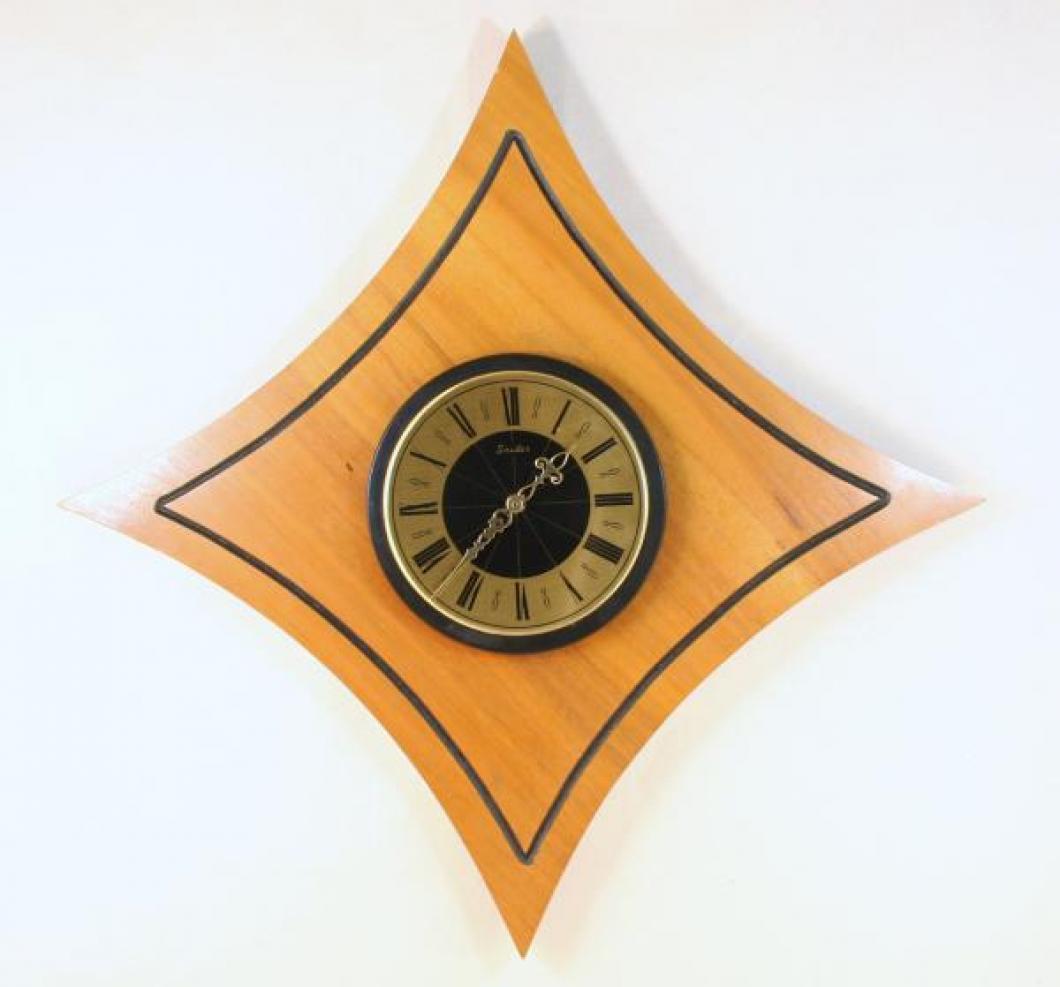 Snider wood panel wall clock (around 1970, walnut wood, electromechanical battery movement)