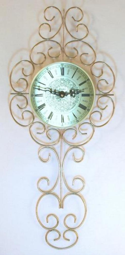 Snider brass-plated rods wall clock (late 1960s, electromechanical battery movement)