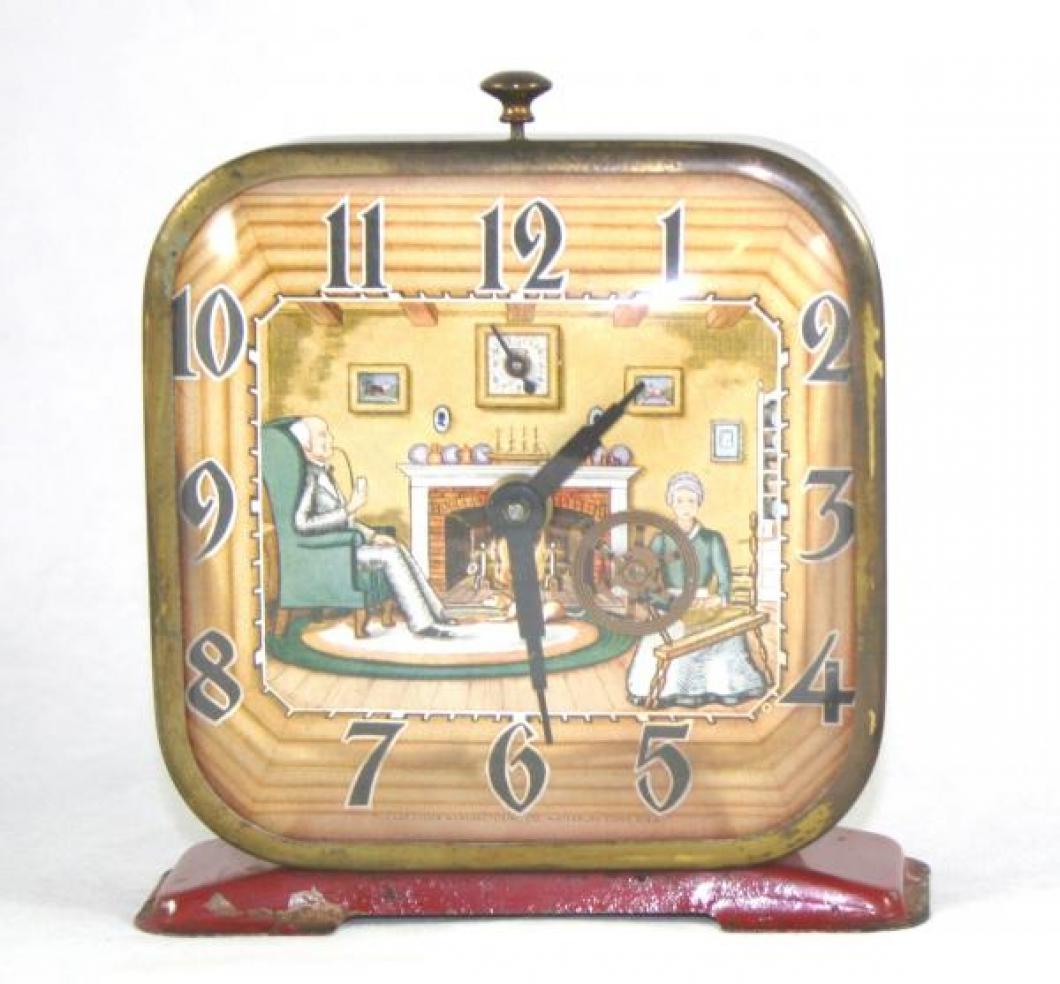 Lux "Spinning Wheel" animated alarm clock (windup, wheel turns slowly, United States, 1940s/50s?)