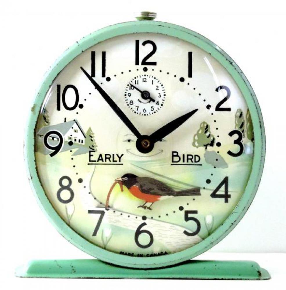 Westclox "Early Bird" model animated alarm clock with turquoise case  (windup, bobbing robin pulling worm, late 1940s to 1950s)