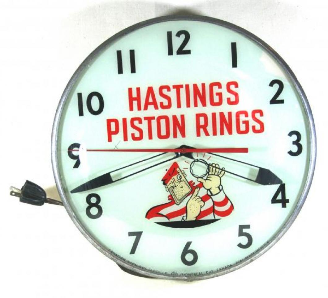 Advertising clock made by the Canadian Neon-Ray Clock Co., Montreal QC, advertising Hastings Piston Rings