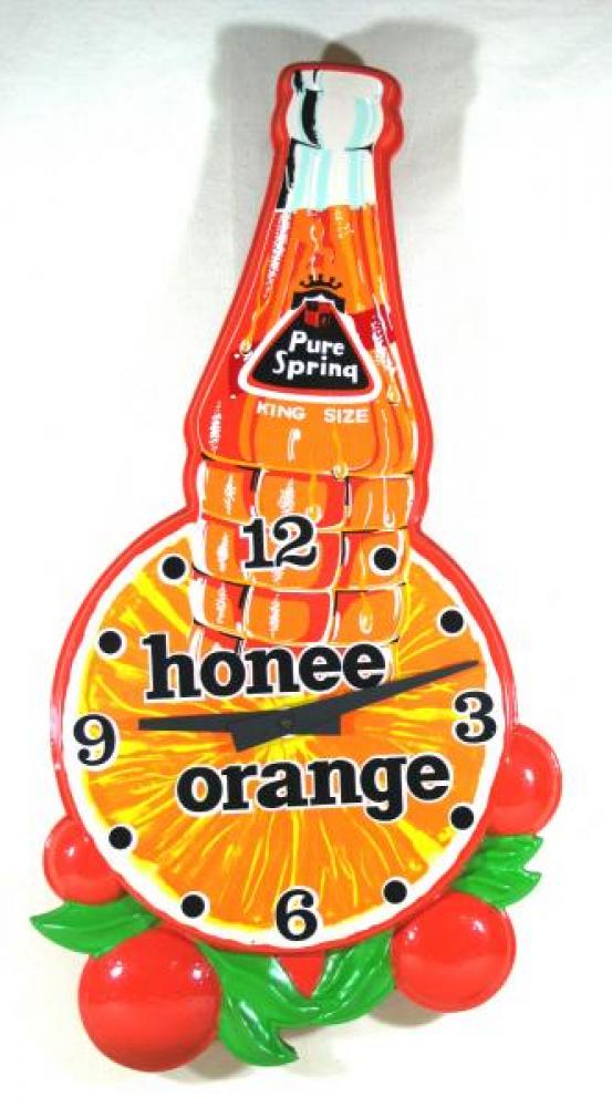 Advertising clock made by Street Display Services in Don Mills, ON, advertising Honee Orange soda