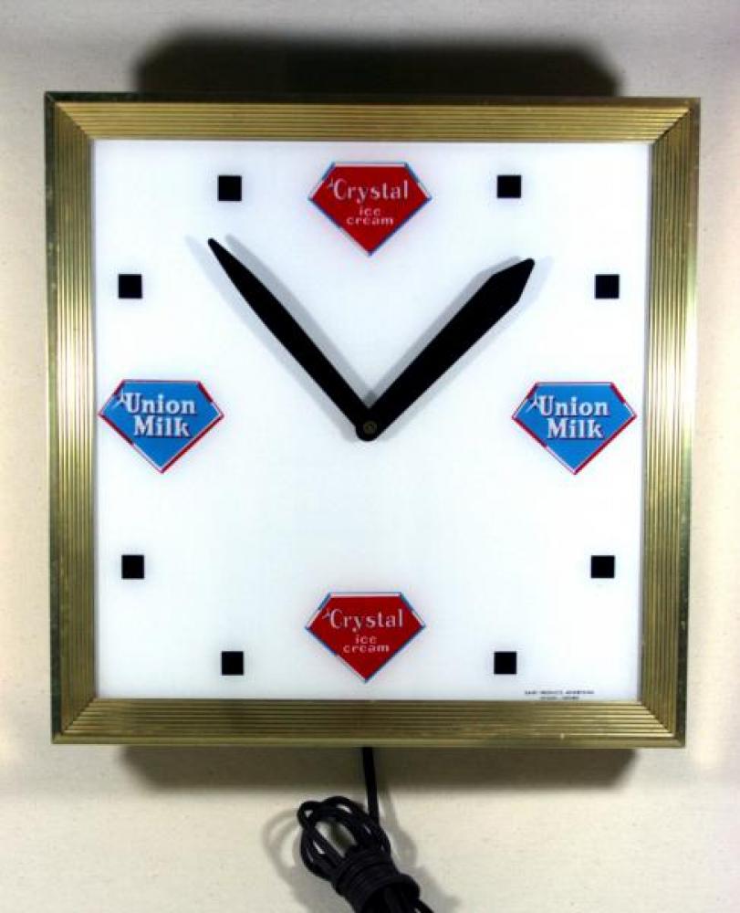 Advertising clock made by the Wolfe Bros. Advertising Industries Ltd., in Toronto, ON, advertising Union Milk and Crystal Ice Cream