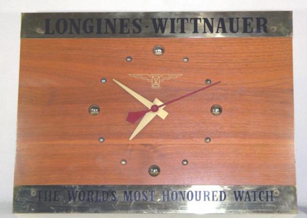 Advertising clock made by Creative Display Advertising Ltd. in Toronto, ON, advertising Longines-Wittnauer Watches