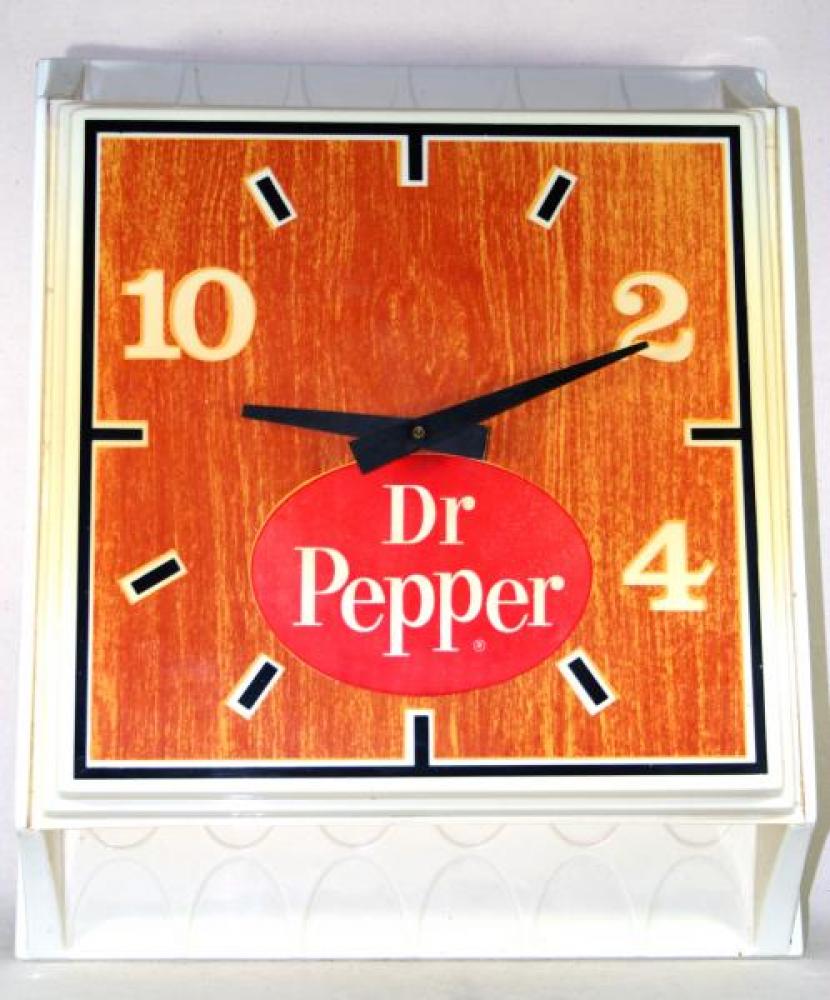 Advertising clock made by Street Display Services in Don Mills, ON, advertising Dr. Pepper soft drink