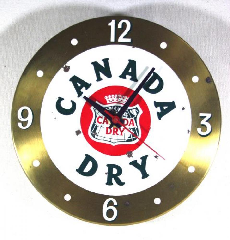 Advertising clock made by Gorrie Advertising Ltd., Toronto, ON, advertising Canada Dry
