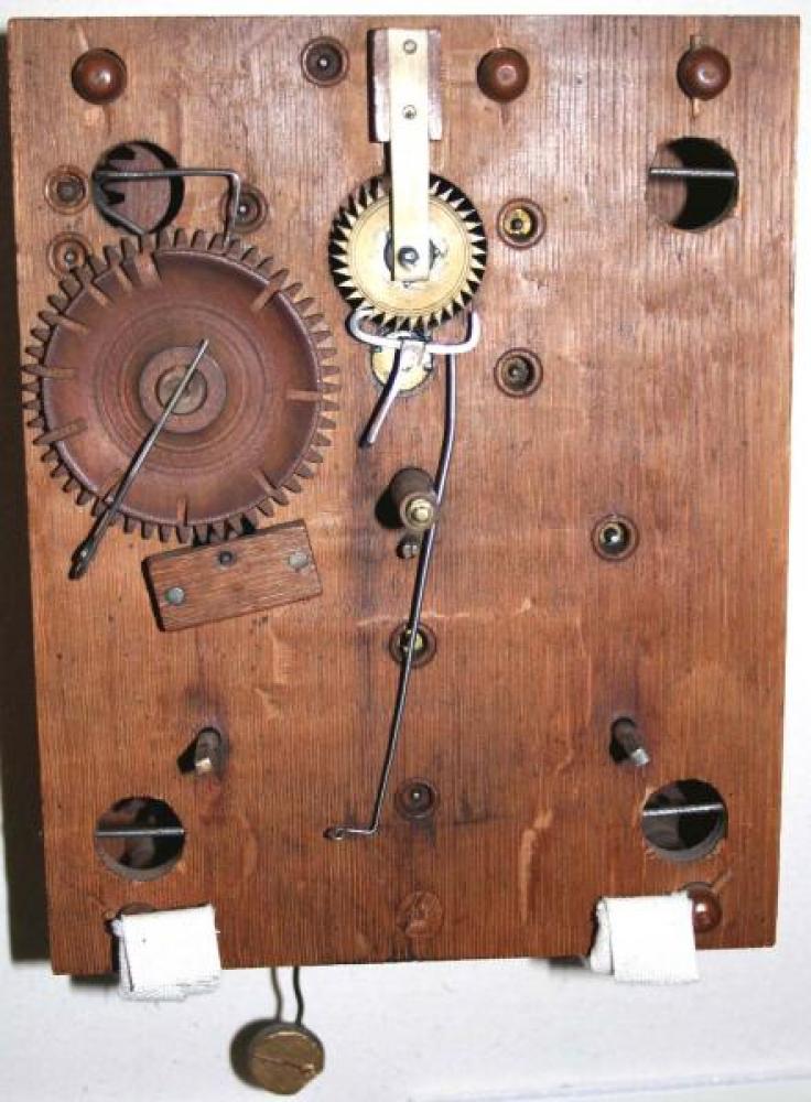 Example of early 1830s wood 30-hour, weight-driven clock movement (oak plates, cherry gears)
