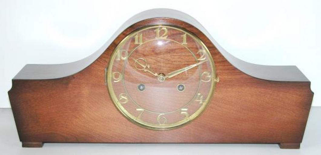 Possibly Style 102 postwar mantel clock, stained birch wood case.