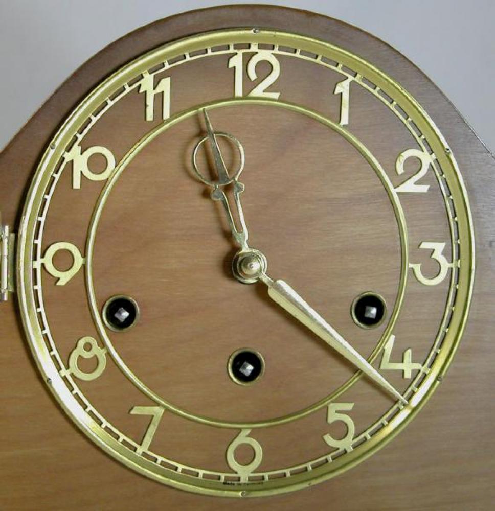 The typical hands and skeleton chapter ring on postwar mantel clocks.
