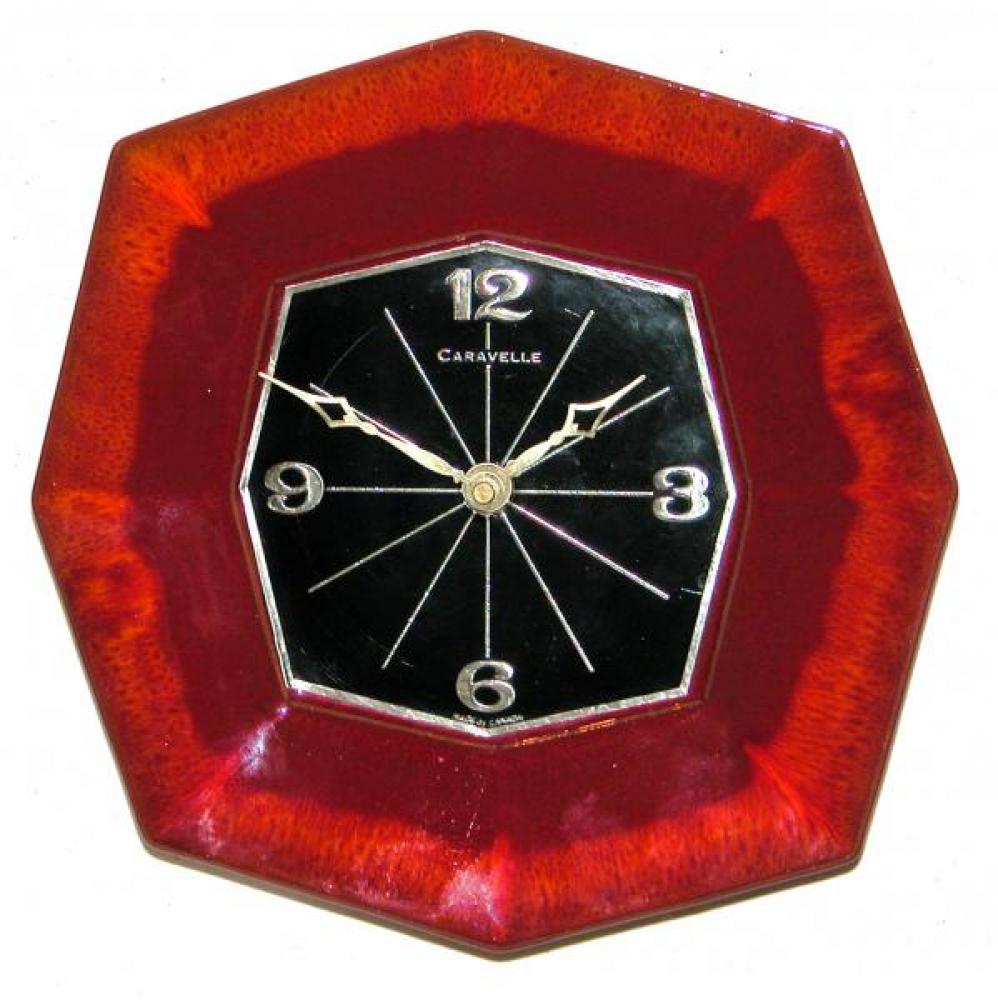 Red version Caravelle octagonal plate model battery wall clock.