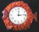 Online picture of the red version of the Caravelle fish model battery wall clock (museum still looking for one).