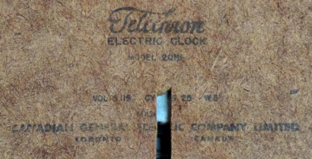 Another typical Toronto ink label (model 2QM1) on back of clock